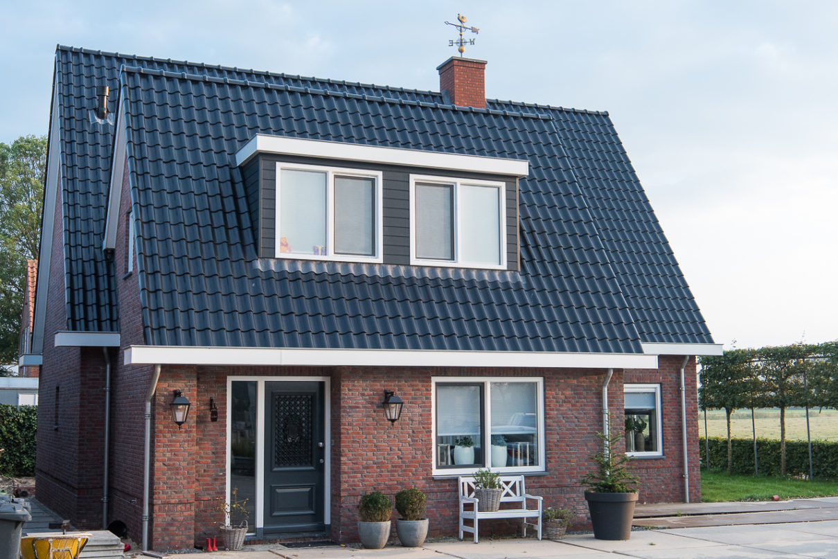 vrijstaande woning voorzien van kunststof